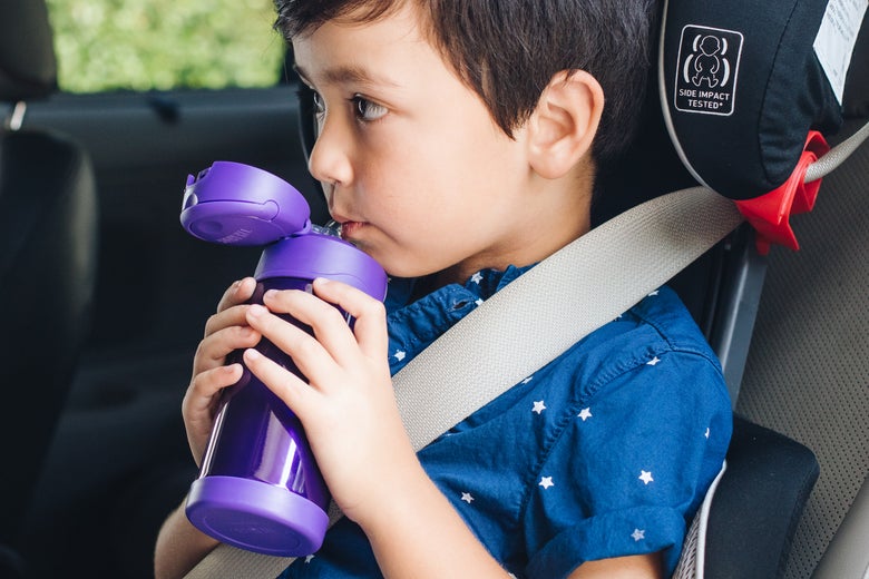 child with water bottle